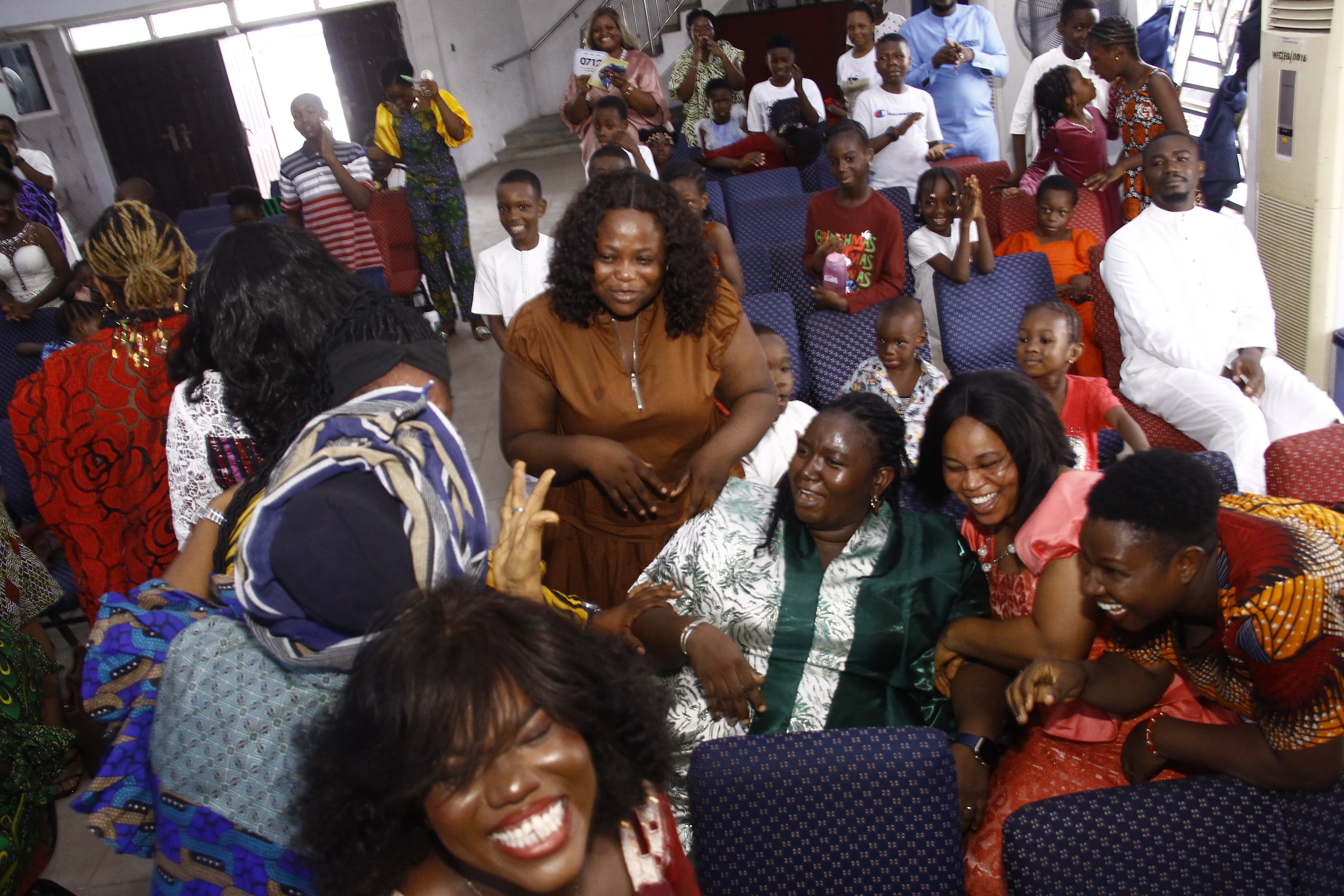 Congregation erupting in laughter together
