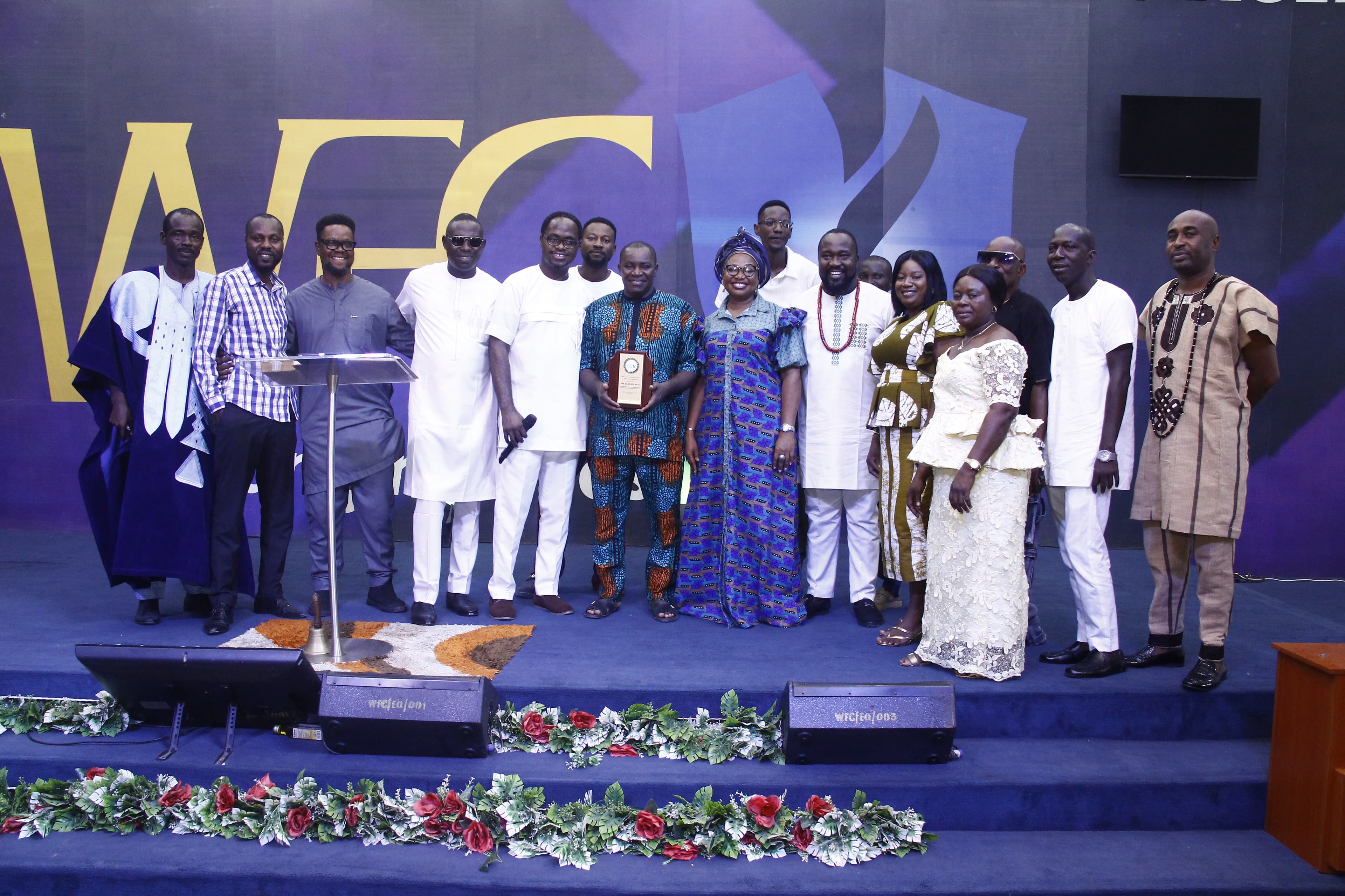 Large group photo on stage during special programme